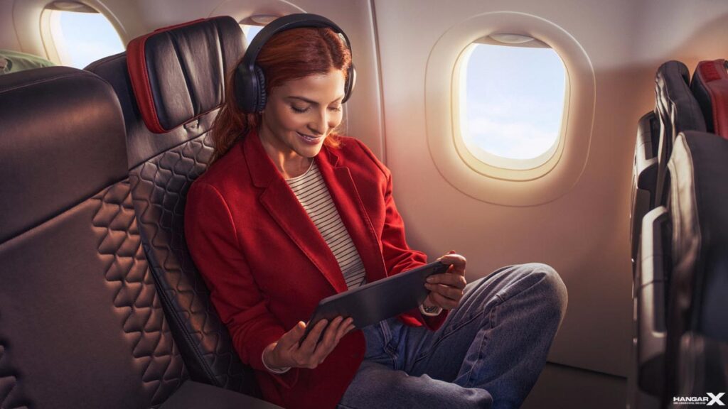 Vuelos directos de Avianca conectan Aeroparque con Bogotá Pasajera disfrutando del servicio a bordo de la Business Class Americas de Avianca, en un vuelo directo entre Aeroparque y Bogota
